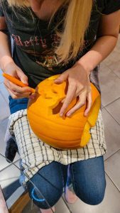 Carving the Designs in a pumpkin